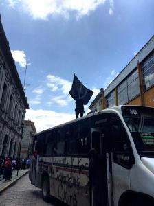 A bus serves as a barricade in the historic city center of Oaxaca.
